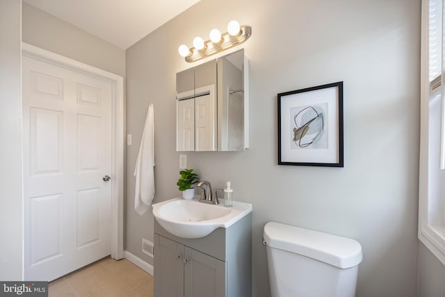 4703 Williston St, Baltimore, MD 21229 - bathroom featuring vanity and tile patterned flooring