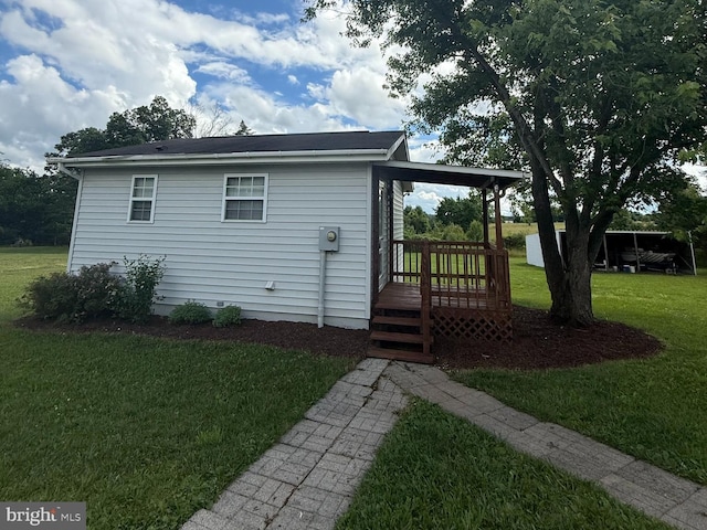 434 Anderson Rd, Martinsburg, WV 25404 - view of side of home featuring a lawn and a wooden deck