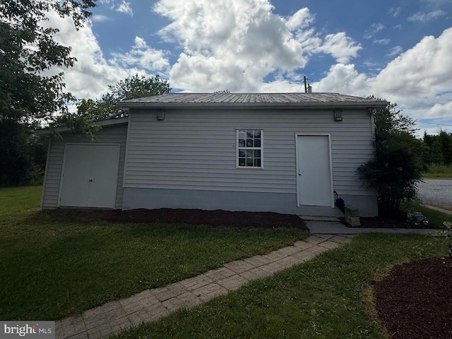 434 Anderson Rd, Martinsburg, WV 25404 - back of house featuring a lawn and a metal roof