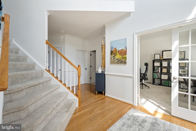 17 Saint Claires Ct, Stafford, VA 22556 - foyer entrance with light wood-type flooring, crown molding, and stairway