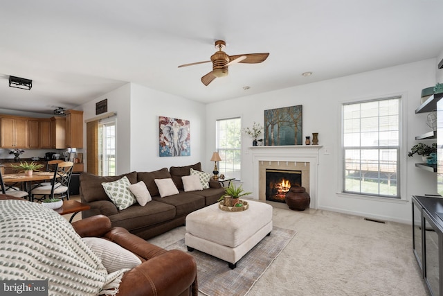 17 Saint Claires Ct, Stafford, VA 22556 - living room with ceiling fan, light colored carpet, and a glass covered fireplace