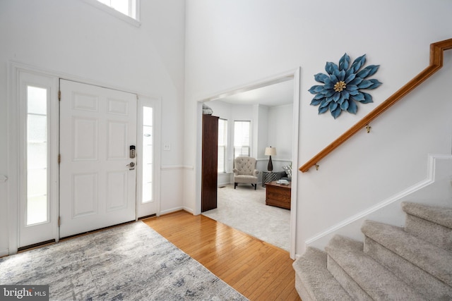 17 Saint Claires Ct, Stafford, VA 22556 - entryway with hardwood / wood-style floors, stairway, and a towering ceiling