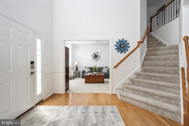 17 Saint Claires Ct, Stafford, VA 22556 - foyer featuring wood finished floors, stairs, and a high ceiling