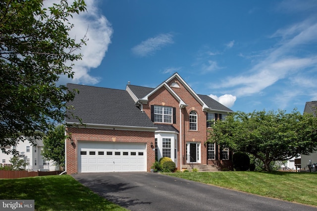 17 Saint Claires Ct, Stafford, VA 22556 - view of front of home with brick siding, driveway, and an attached garage