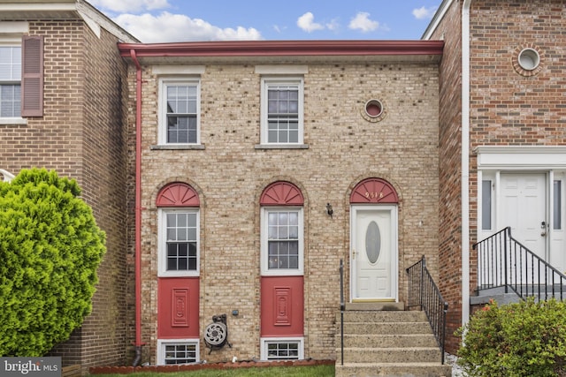 9518 Unity Ln, Lorton, VA 22079 - townhome / multi-family property with brick siding and entry steps