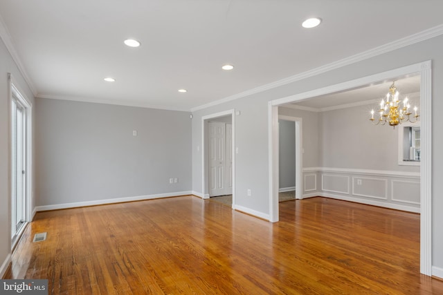 9518 Unity Ln, Lorton, VA 22079 - spare room featuring a chandelier, wood finished floors, recessed lighting, and ornamental molding