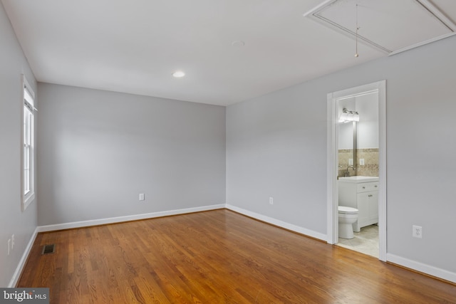 9518 Unity Ln, Lorton, VA 22079 - empty room featuring attic access, wood finished floors, and recessed lighting