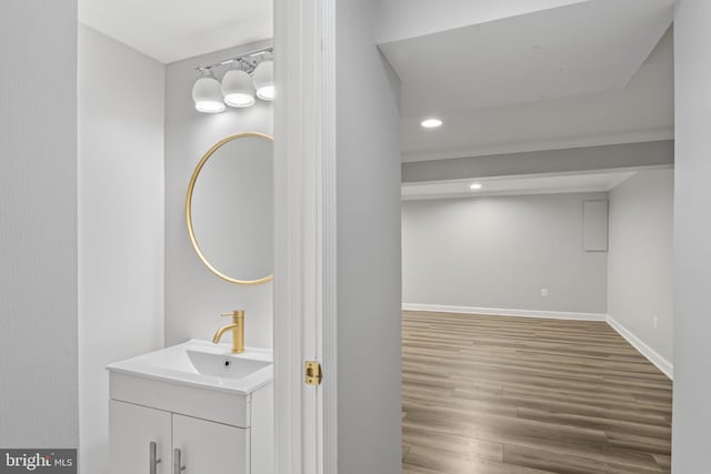 9518 Unity Ln, Lorton, VA 22079 - bathroom with wood finished floors, vanity, and recessed lighting
