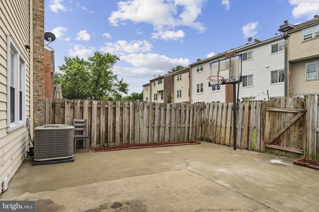 9518 Unity Ln, Lorton, VA 22079 - fenced backyard featuring a patio area, a gate, and a residential view