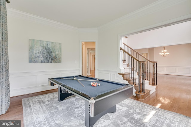 10002 Courthouse Rd, Vienna, VA 22181 - game room with billiards table, crown molding, wood finished floors, a decorative wall, and a chandelier