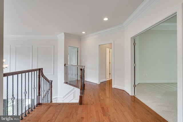10002 Courthouse Rd, Vienna, VA 22181 - corridor with an upstairs landing, ornamental molding, wood finished floors, and recessed lighting