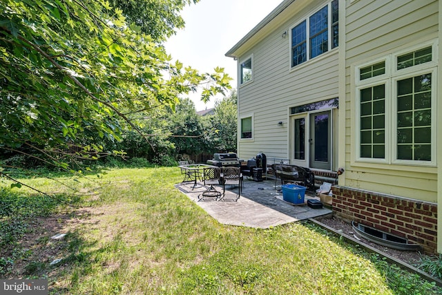 10002 Courthouse Rd, Vienna, VA 22181 - view of grassy yard featuring a patio