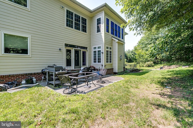 10002 Courthouse Rd, Vienna, VA 22181 - back of property featuring a patio and a yard
