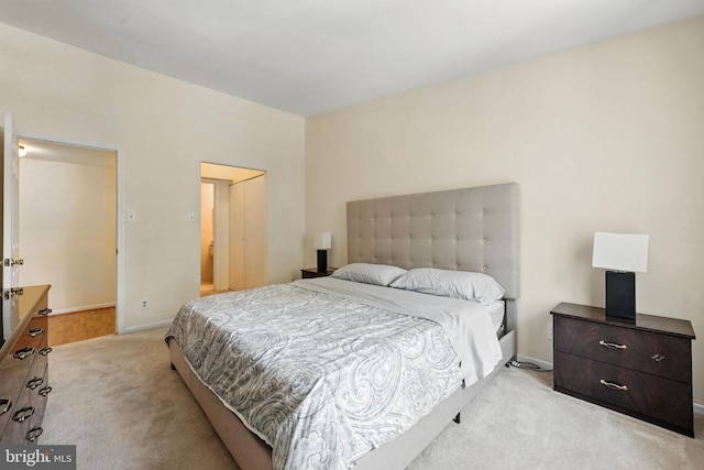 20315 Beaconfield Ter Unit 202, Germantown, MD 20874 - bedroom featuring light colored carpet and baseboards