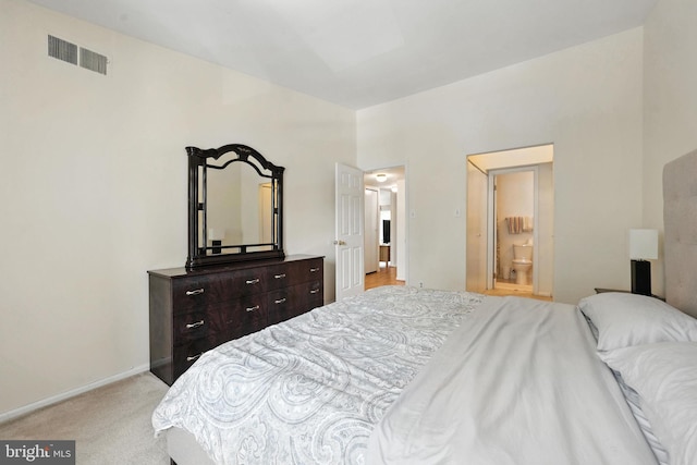 20315 Beaconfield Ter Unit 202, Germantown, MD 20874 - bedroom with light colored carpet and ensuite bath
