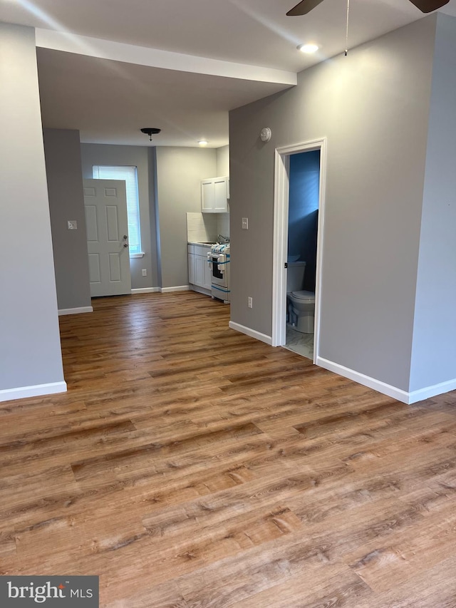 2036 W Ontario St, Philadelphia, PA 19140 - unfurnished living room with ceiling fan and wood finished floors
