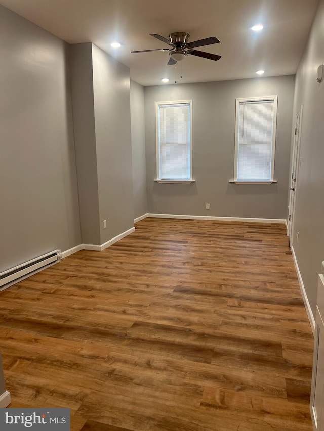 2036 W Ontario St, Philadelphia, PA 19140 - spare room featuring a ceiling fan, recessed lighting, baseboard heating, and wood finished floors