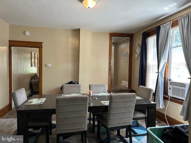 2600 N 5th St, Harrisburg, PA 17110 - dining room with baseboards and cooling unit
