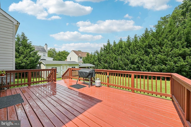 1802 Disney Estates Cir, Severn, MD 21144 - wooden terrace with a lawn, a grill, and an outdoor structure