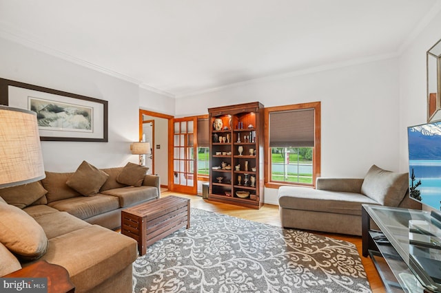 1802 Disney Estates Cir, Severn, MD 21144 - living room featuring wood finished floors, crown molding, and french doors