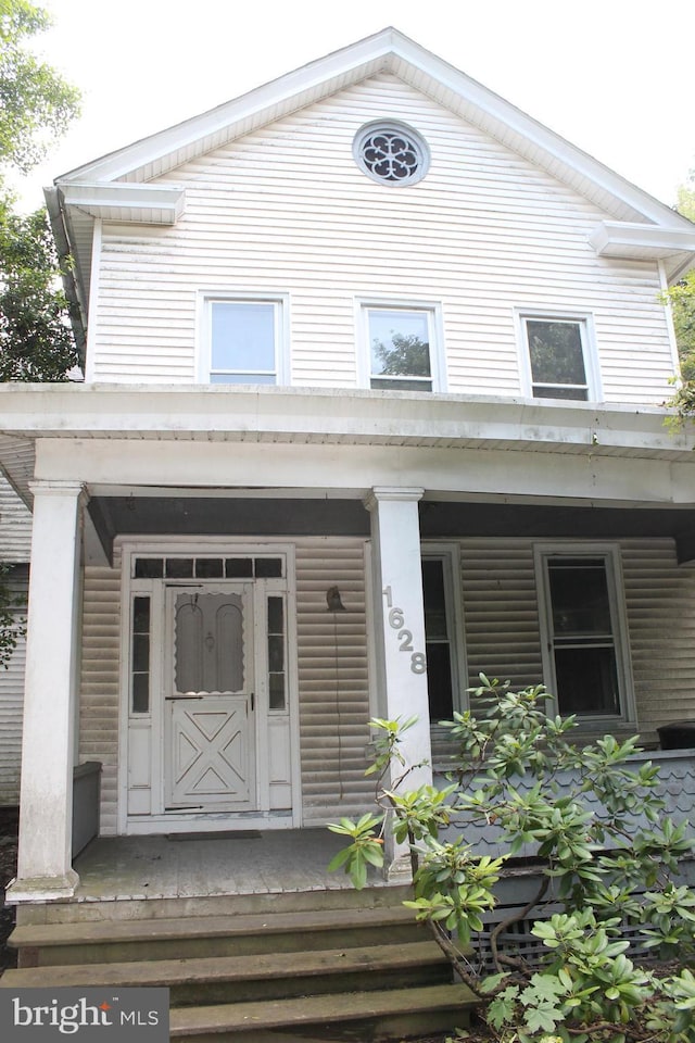 1628 River Rd, Upper Black Eddy, PA 18972 - view of exterior entry with a porch
