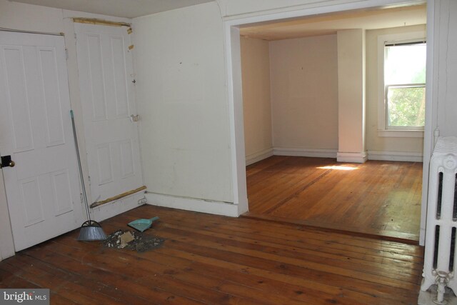 1628 River Rd, Upper Black Eddy, PA 18972 - unfurnished room featuring hardwood / wood-style floors and radiator