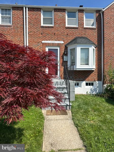8306 Loch Raven, Towson, MD 21286 - view of front facade with brick siding and a front yard