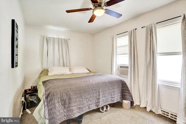 30 N Dwight St, Reading, PA 19609 - carpeted bedroom with cooling unit, a baseboard heating unit, ceiling fan, and ornamental molding