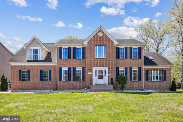 2907 Dumas St, Alexandria, VA 22306 - view of front of home with brick siding and a front yard