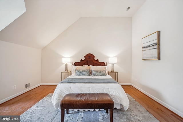 2907 Dumas St, Alexandria, VA 22306 - bedroom featuring wood finished floors and vaulted ceiling