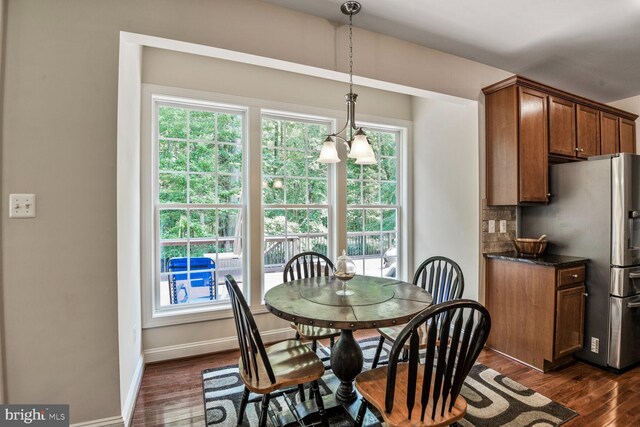 1413 Triton Ct, Edgewater, MD 21037 - dining room featuring dark wood-style flooring and healthy amount of natural light