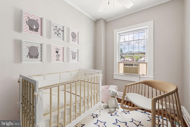 1818 Newton St NE, Washington, DC 20018 - bedroom featuring ornamental molding, a crib, cooling unit, and ceiling fan