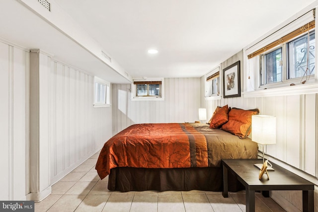 1818 Newton St NE, Washington, DC 20018 - bedroom with light tile patterned floors and multiple windows