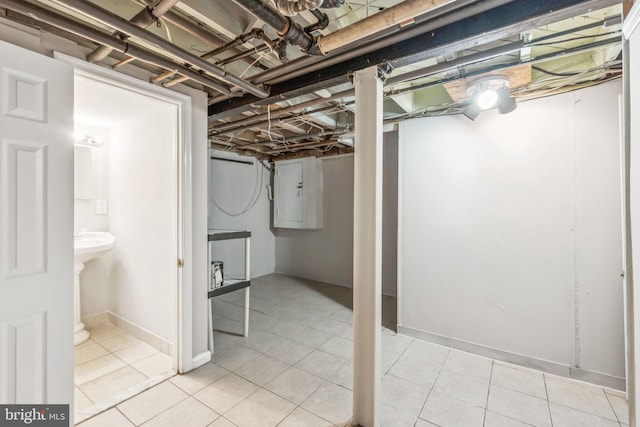 1818 Newton St NE, Washington, DC 20018 - unfinished basement featuring electric panel and light tile patterned floors