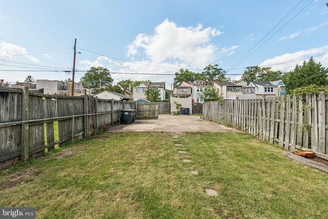 1818 Newton St NE, Washington, DC 20018 - fenced backyard with a patio area, a residential view, and concrete driveway