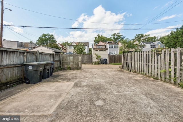1818 Newton St NE, Washington, DC 20018 - fenced backyard featuring a residential view and a patio area
