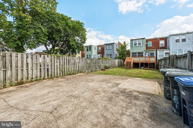 1818 Newton St NE, Washington, DC 20018 - fenced backyard featuring a deck, stairway, and a residential view