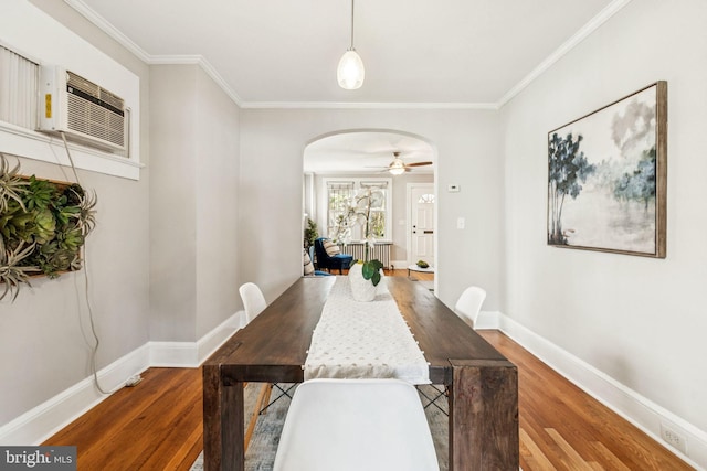 1818 Newton St NE, Washington, DC 20018 - dining room featuring arched walkways, wood finished floors, ornamental molding, and a ceiling fan