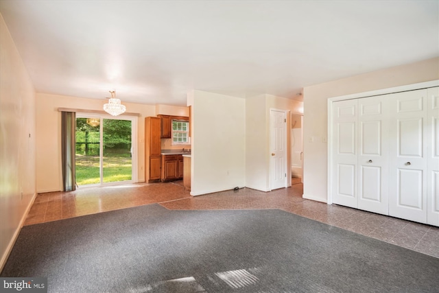 14050 Oaks Rd, Hughesville, MD 20637 - unfurnished living room featuring baseboards