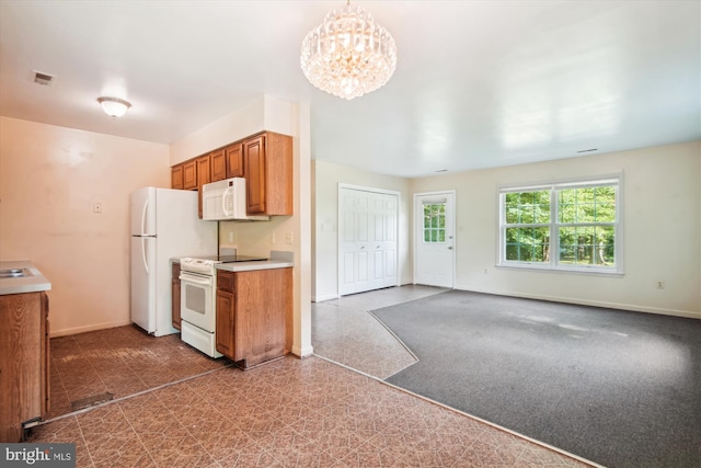 14050 Oaks Rd, Hughesville, MD 20637 - kitchen with white appliances, brown cabinetry, a chandelier, tile patterned floors, and light countertops