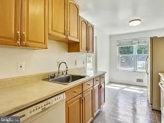 5005 Berwyn Rd, College Park, MD 20740 - kitchen featuring white dishwasher and light countertops
