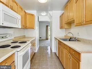 5005 Berwyn Rd, College Park, MD 20740 - kitchen featuring white appliances and light countertops