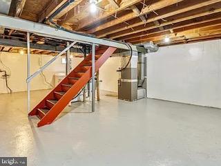 5005 Berwyn Rd, College Park, MD 20740 - unfinished basement featuring heating unit and stairs