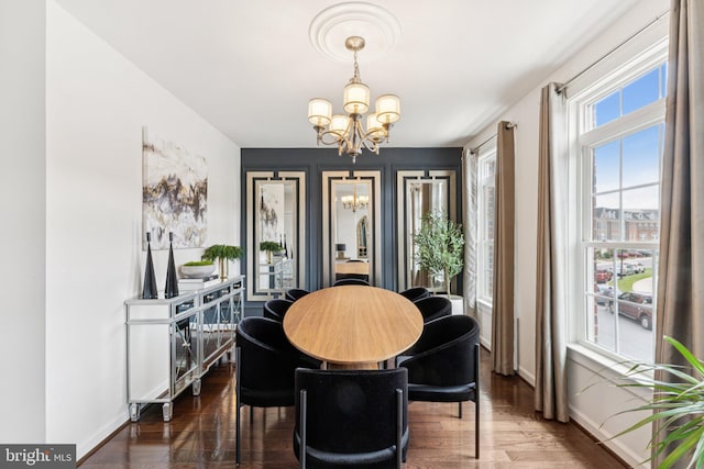 5445 Stream Bank Ln, Greenbelt, MD 20770 - dining room featuring a chandelier and wood finished floors