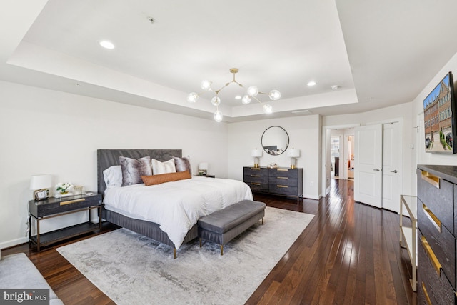 5445 Stream Bank Ln, Greenbelt, MD 20770 - bedroom with a tray ceiling, a chandelier, dark wood finished floors, and recessed lighting