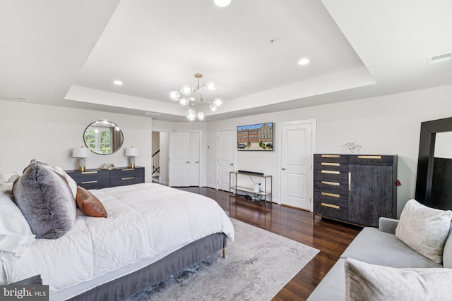 5445 Stream Bank Ln, Greenbelt, MD 20770 - bedroom with a raised ceiling, wood finished floors, a chandelier, and recessed lighting