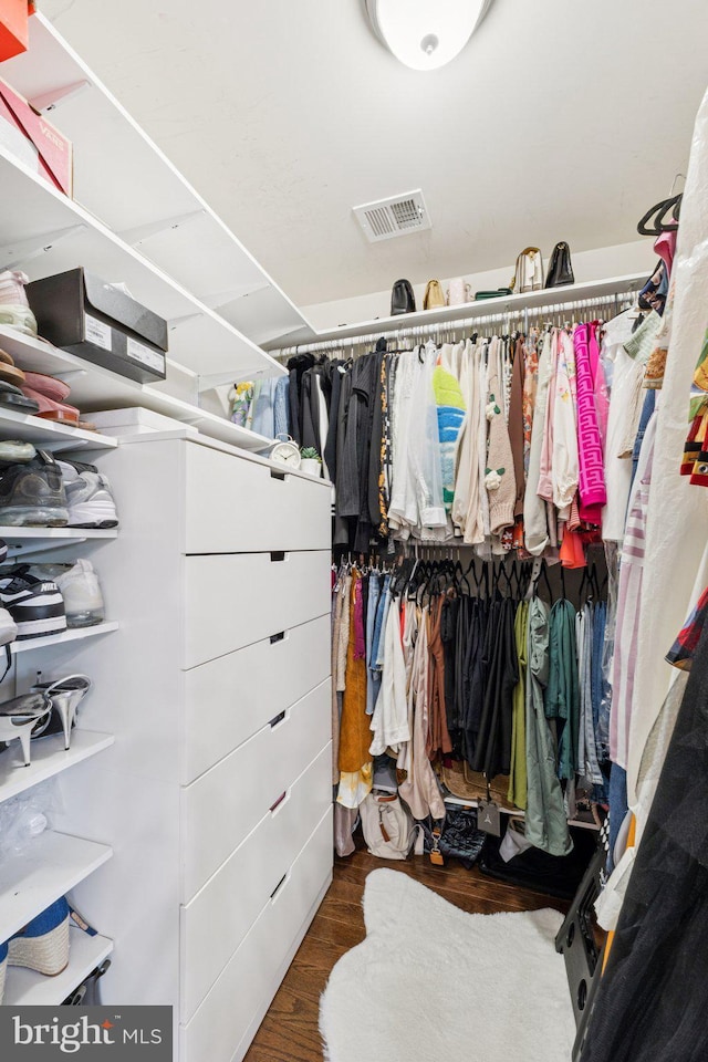 5445 Stream Bank Ln, Greenbelt, MD 20770 - walk in closet featuring wood finished floors