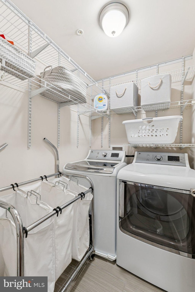 5445 Stream Bank Ln, Greenbelt, MD 20770 - washroom featuring washing machine and clothes dryer