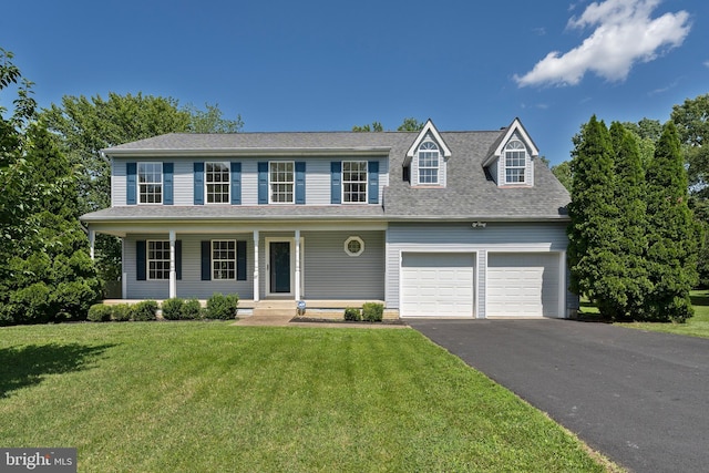 27 Brown Cir, Fredericksburg, VA 22405 - view of front facade with a garage, asphalt driveway, a front lawn, a porch, and a shingled roof