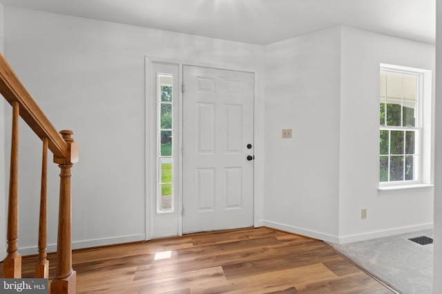 27 Brown Cir, Fredericksburg, VA 22405 - foyer with plenty of natural light, wood finished floors, and stairs